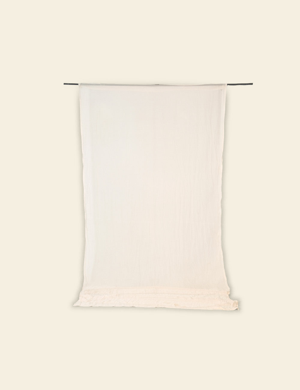 White pillow on a beige background