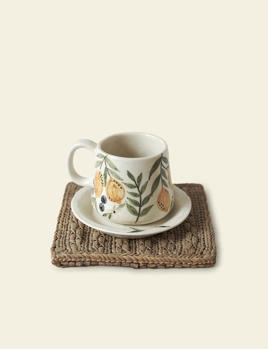 Off-White Ceramic Coffee Mug with White Saucer and Placemat